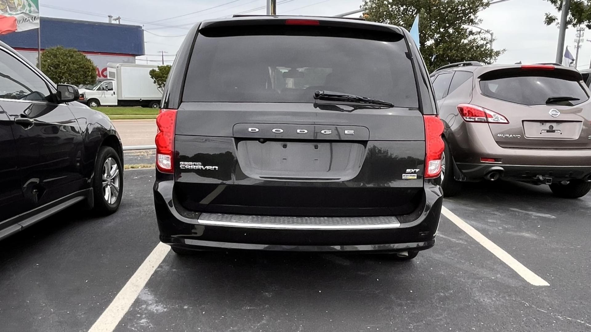 2018 Black Dodge Grand Caravan (2C4RDGCG9JR) , located at 945 E. Jefferson Blvd, Dallas, TX, 75203, (214) 943-7777, 32.752514, -96.811630 - Photo#3